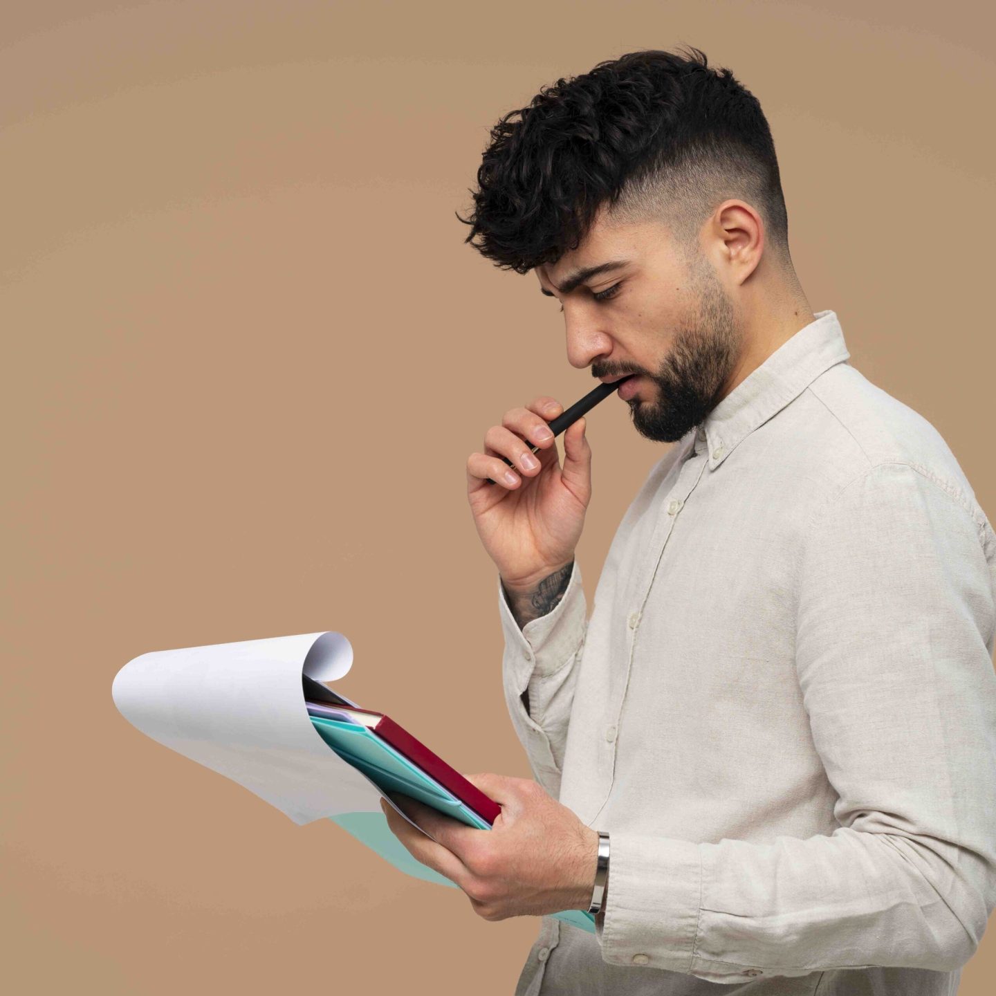 medium-shot-man-with-paperwork copy
